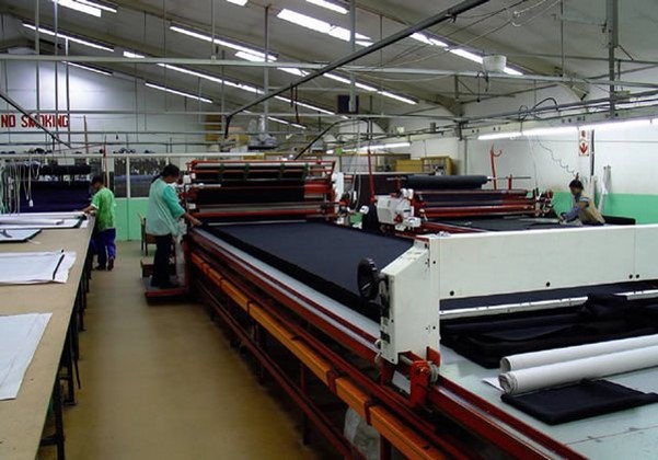 Fabric lay up and cutting in a linen factory