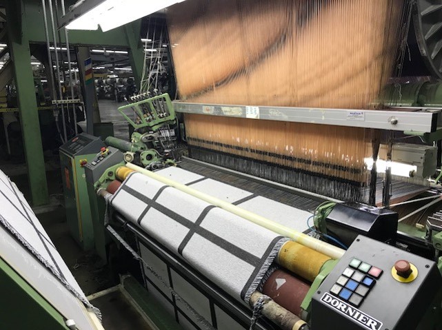 A jacquard loom in action