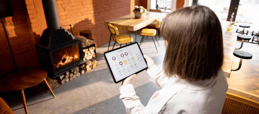 Woman controlling home device remotely
